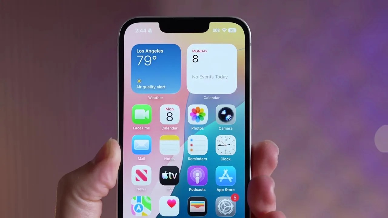 Side-by-side comparison of old notched iPhone and the new iPhone 18E with Dynamic Island